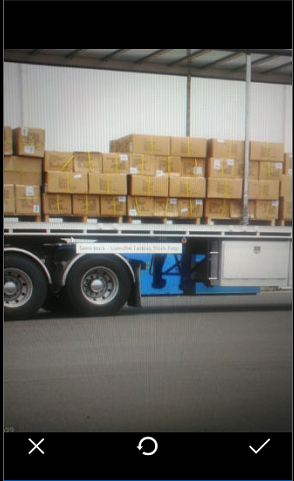 With the cross the photo can be removed, with the circle arrow a new photo can be taken and with the tick as can be accepted